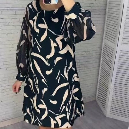 Lose bedrucktes langärmeliges Kleid mit Rundhalsausschnitt