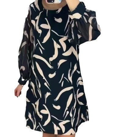 Lose bedrucktes langärmeliges Kleid mit Rundhalsausschnitt