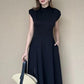 Einfarbiges, ärmelloses Kleid mit Taillenbetonung und Schlitz