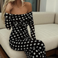 Elegantes Kleid mit Tupfenmuster und freien Schultern