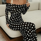 Elegantes Kleid mit Tupfenmuster und freien Schultern