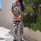 Lässiges Damen-Set mit bedrucktem Kurzarmhemd und weitem Bein und Hose