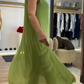 Fließendes grünes ärmelloses Maxikleid