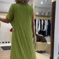Fließendes grünes ärmelloses Maxikleid