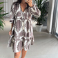 Damenmode-Minikleid mit V-Ausschnitt und Print