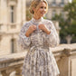 Elegantes A-Linien-Minikleid mit hohem Kragen und Laternenärmeln